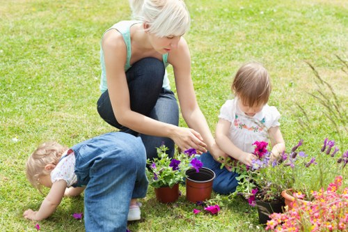 Professional gardener preparing tools before work in Croydon